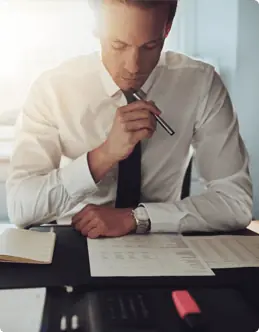 A businessman reading paperwork